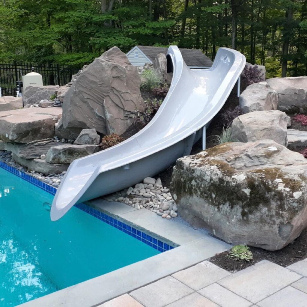 Inground pool slides: Safety information and design ideas